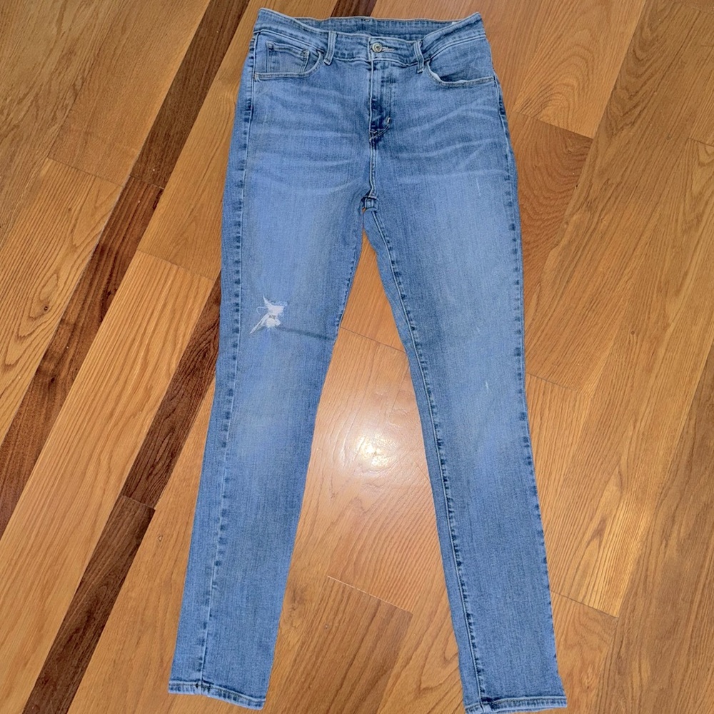 Levis Jeans stretch skinny high rise 721 Ladies 29 x 32 light distressed